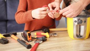 Photo of people repairing electrical products