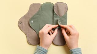 Photo of person demonstrating fabric based menstrual products