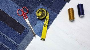 Photo of sewing kit and clothing