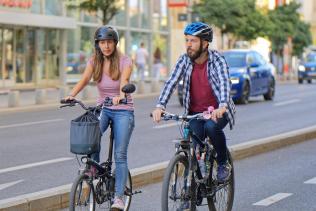 A couple riding bikes