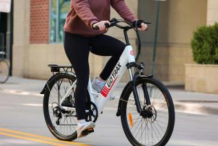 Person cycling on e-bike
